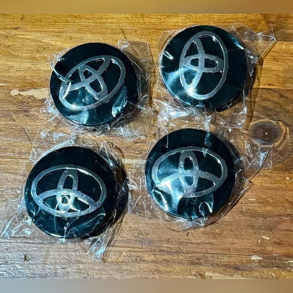 Toyota Other - New Toyota black hub cap covers, set of 4.